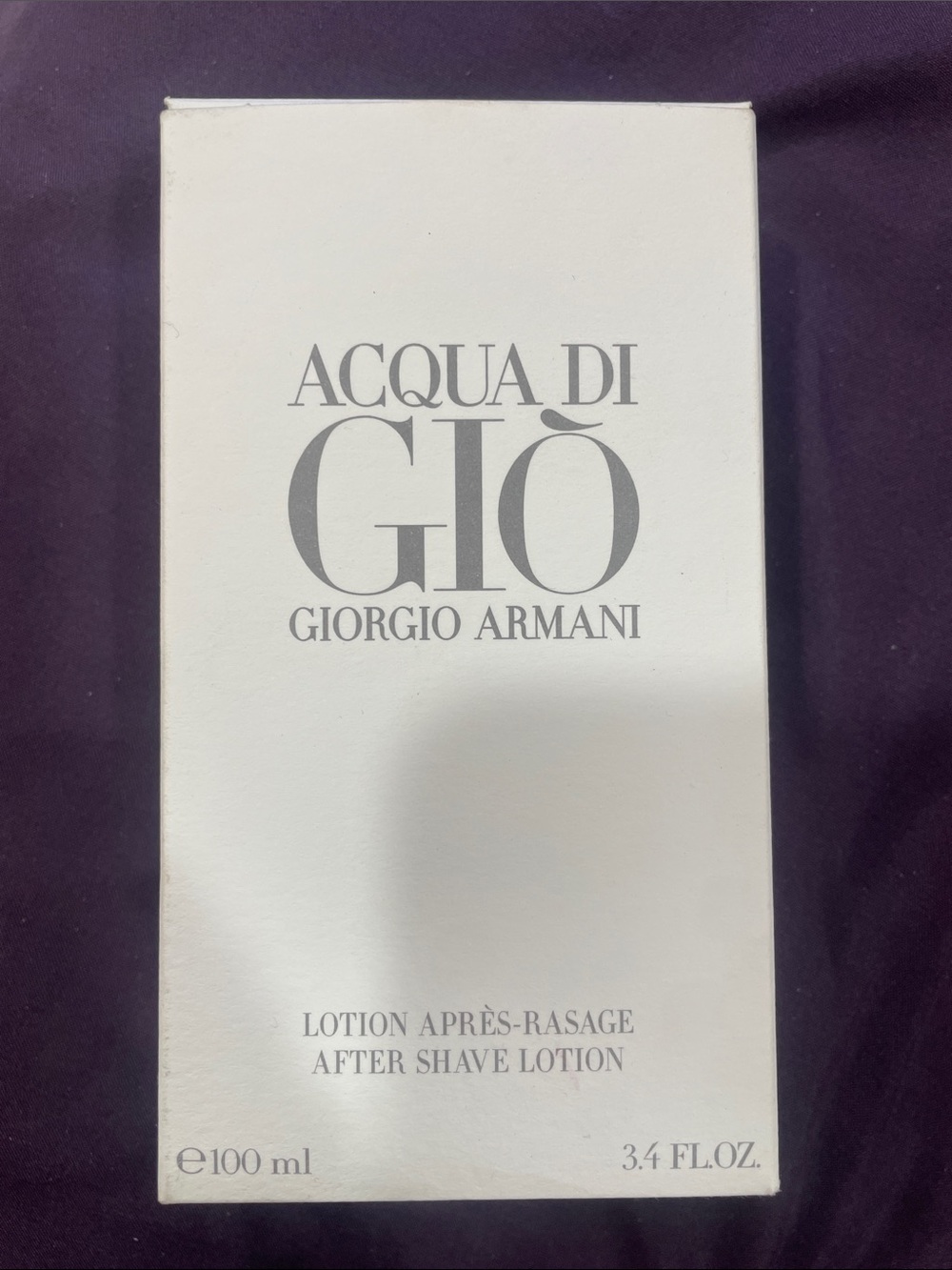 Giorgio Armani Acqua di Giò After Shave Lotion — White and Silver Text
